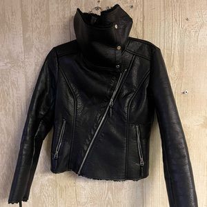 Bebe leather look, asymmetrical zipper, zipper cuffs, mock neck
